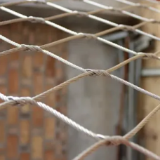 Сетка нержавеющая тросовая с узловым креплением и ромбической ячейкой Н2 7х7 AISI 304 25х43х1 мм